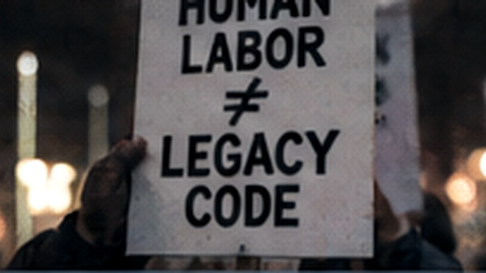 Labor protest sign at night